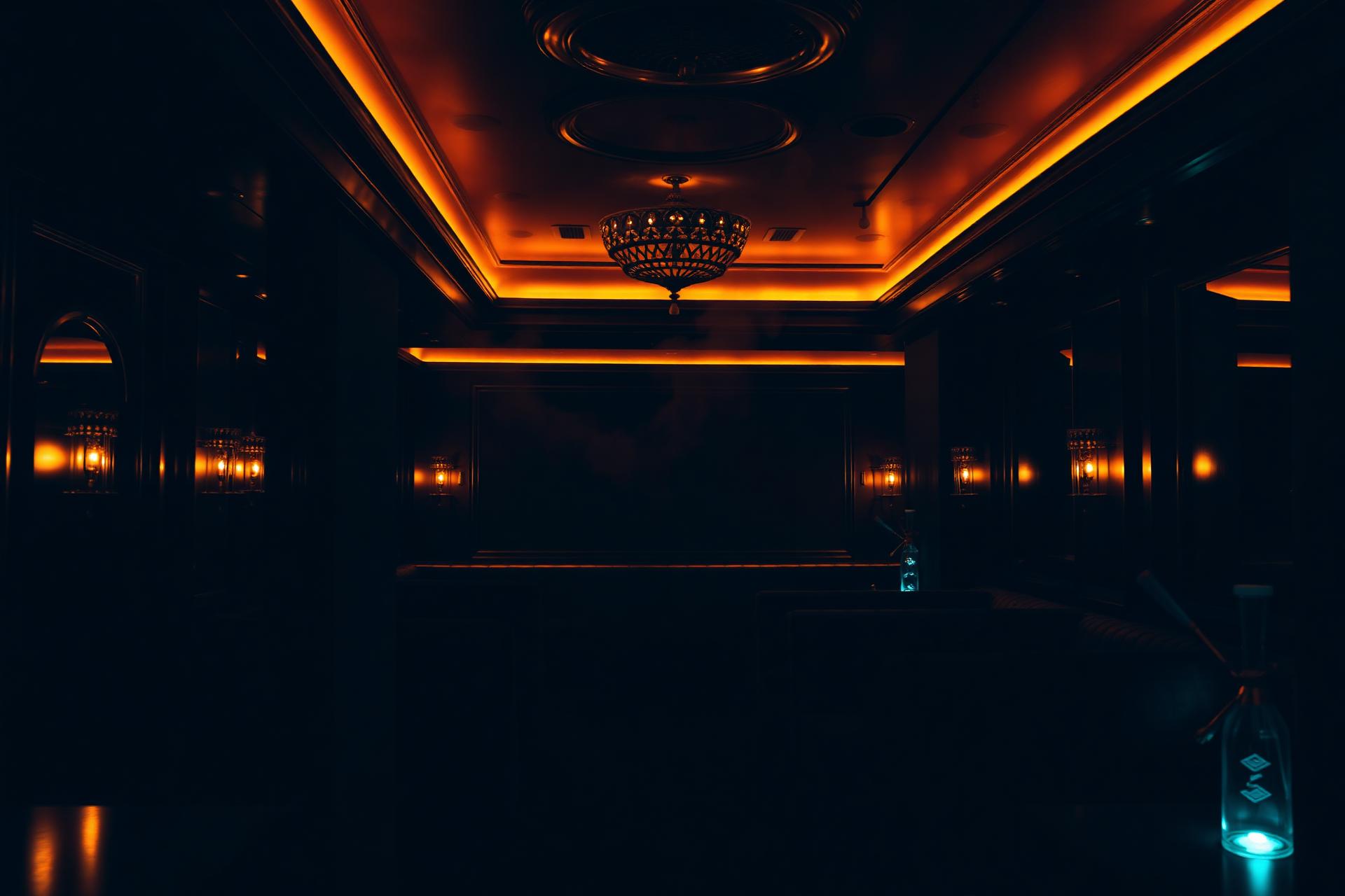 Dimly lit Royal Lounge interior with warm amber lighting